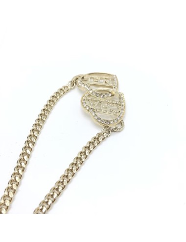 Chanel  Collier ras de cou en forme de cœur doré avec logo