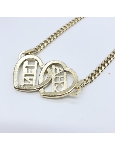 Chanel  Collier ras de cou en forme de cœur doré avec logo