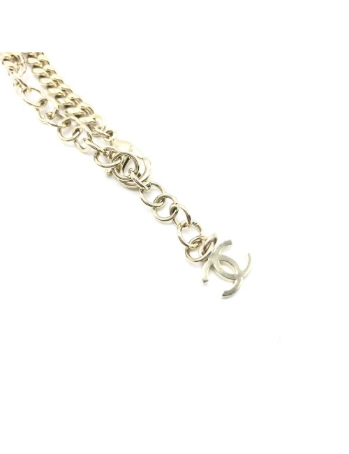 Chanel  Collier ras de cou en forme de cœur doré avec logo